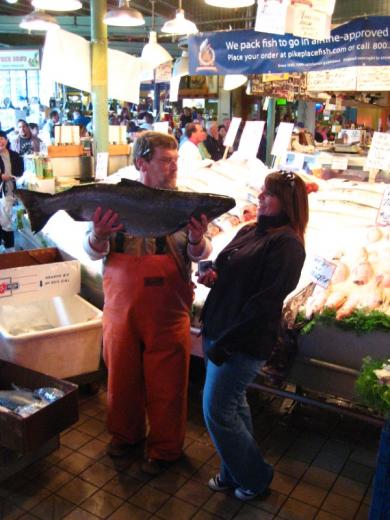 Fishmonger and customer, Seattle, WA
